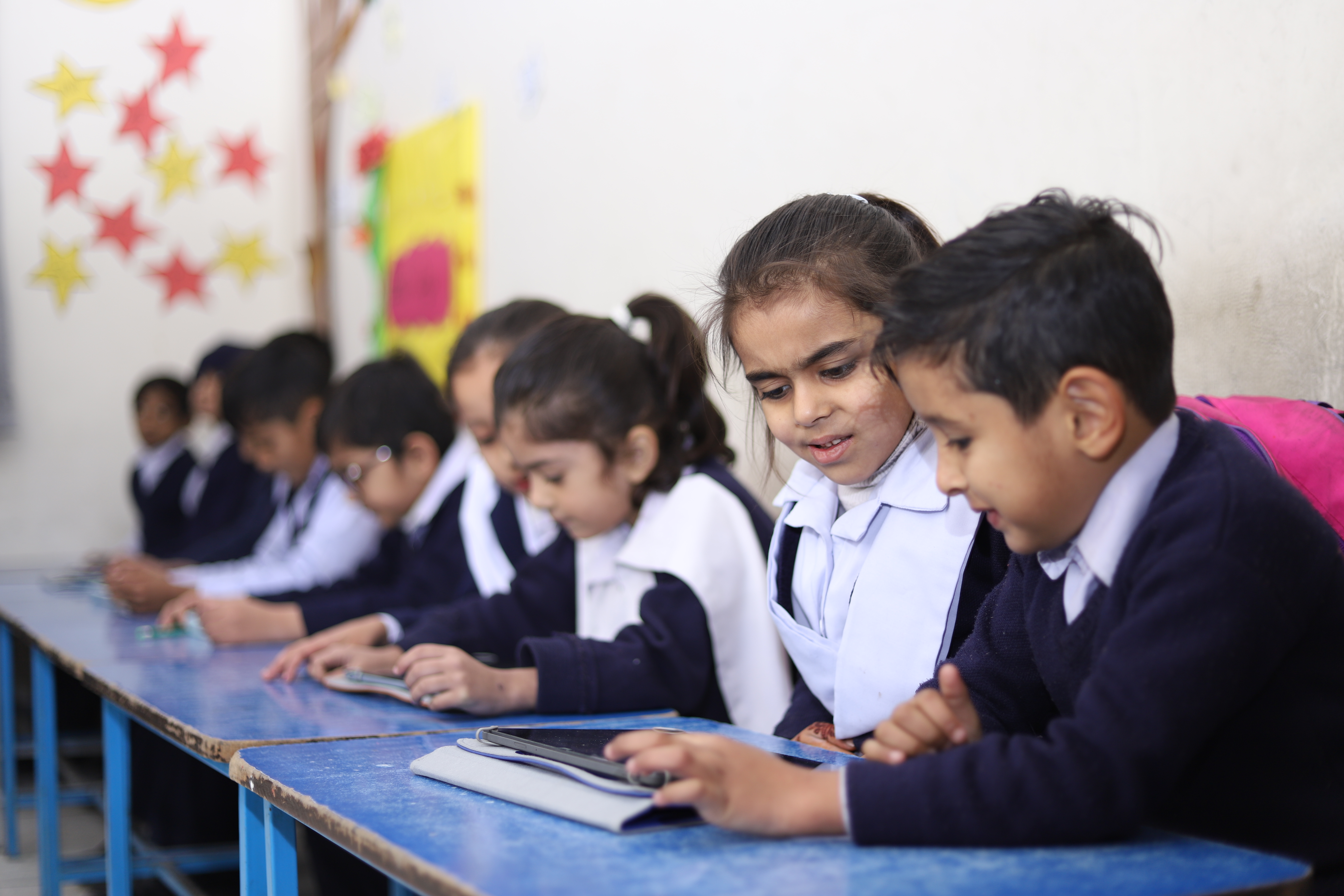 KG students learning with digital tools